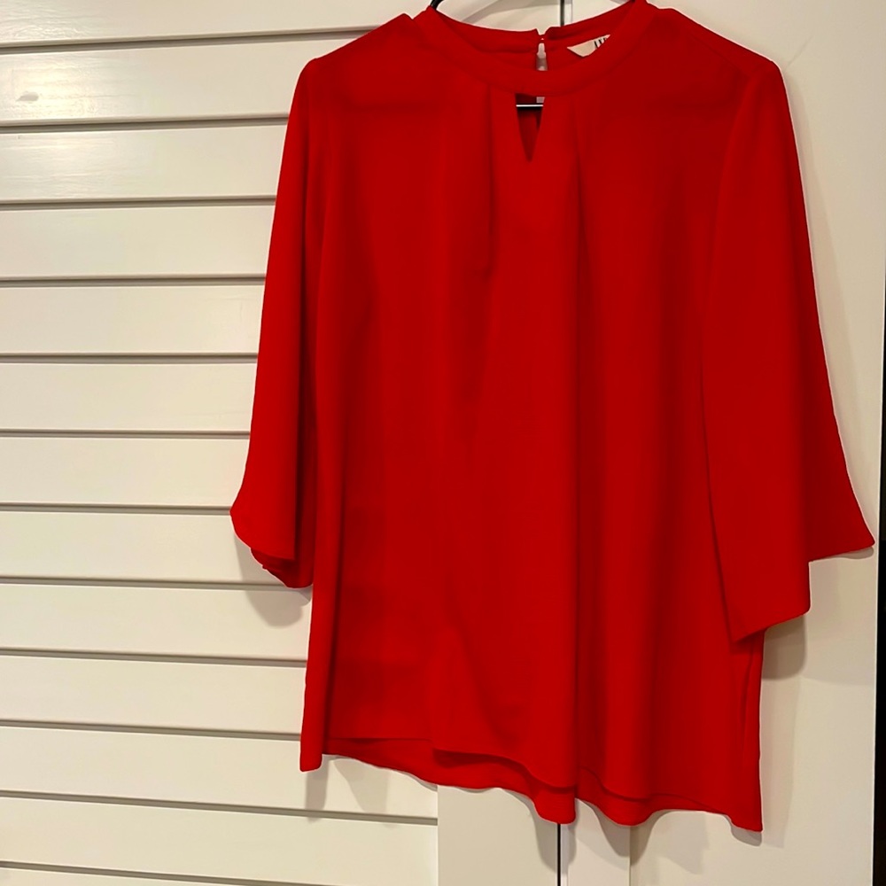 Bright red blouse